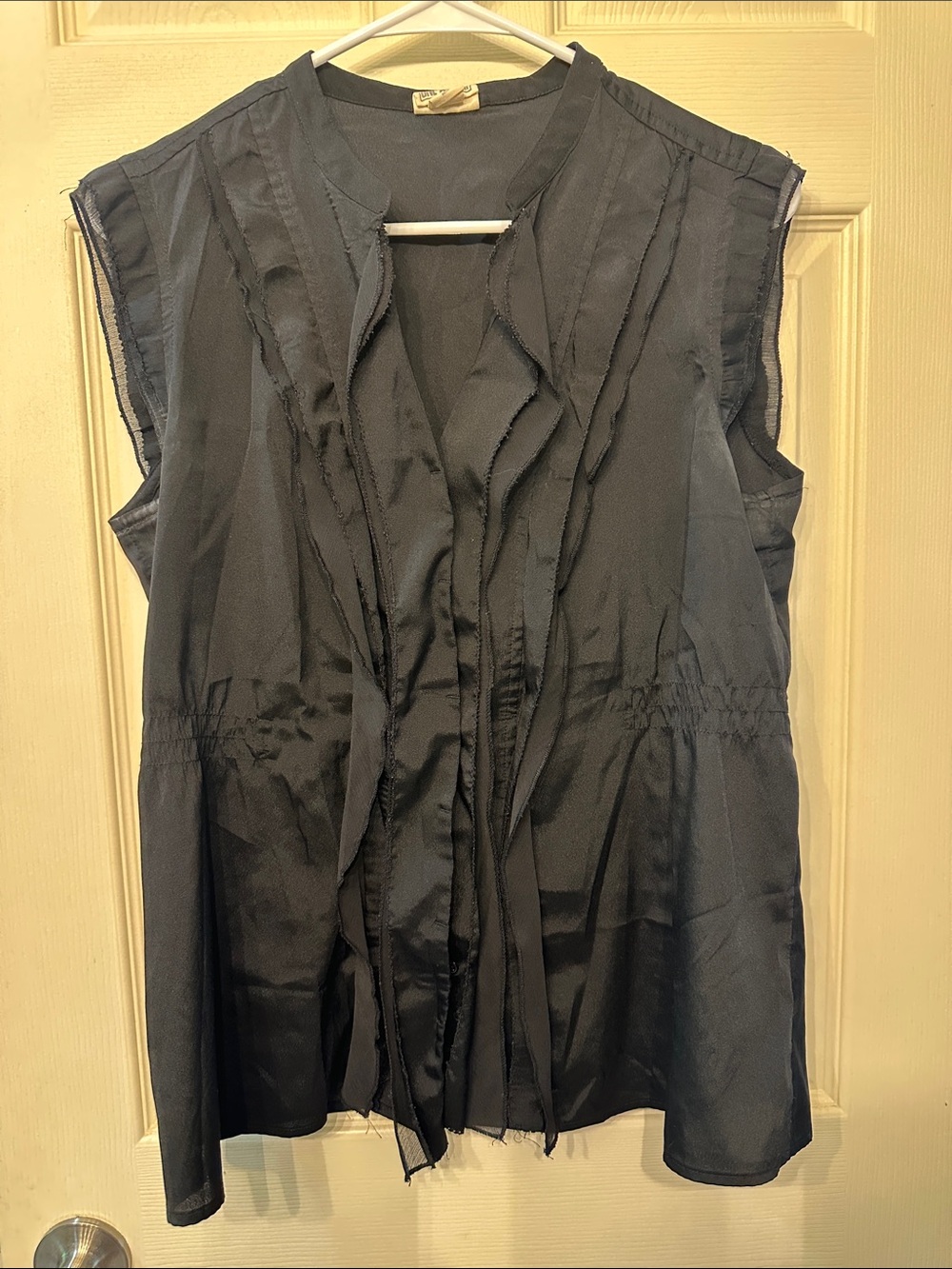 Sleeveless Ruffle-Front Camisole in Black